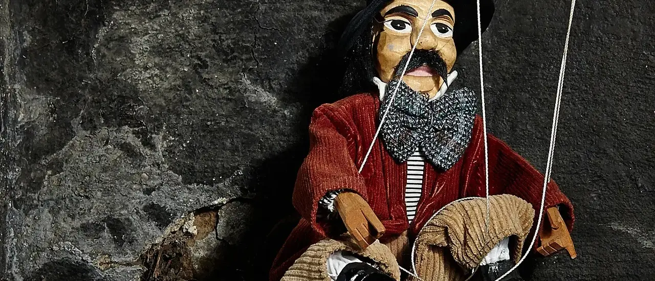 Hvem var Guignol, og hvorfor lever figuren videre i dag?